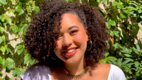 Woman smiling.